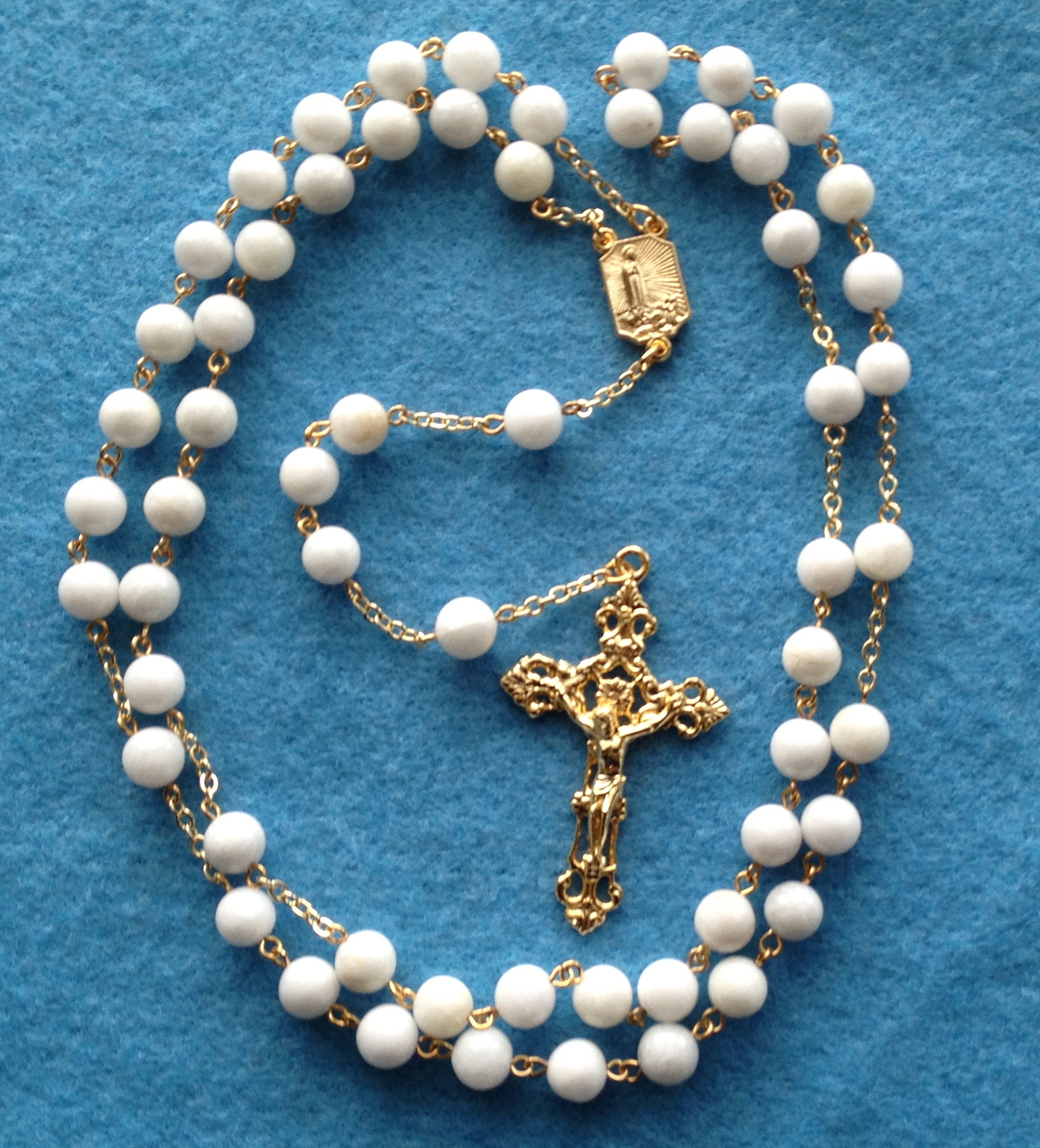 Sodalite Rosary gold tone 8 mm beads, link to purchase button